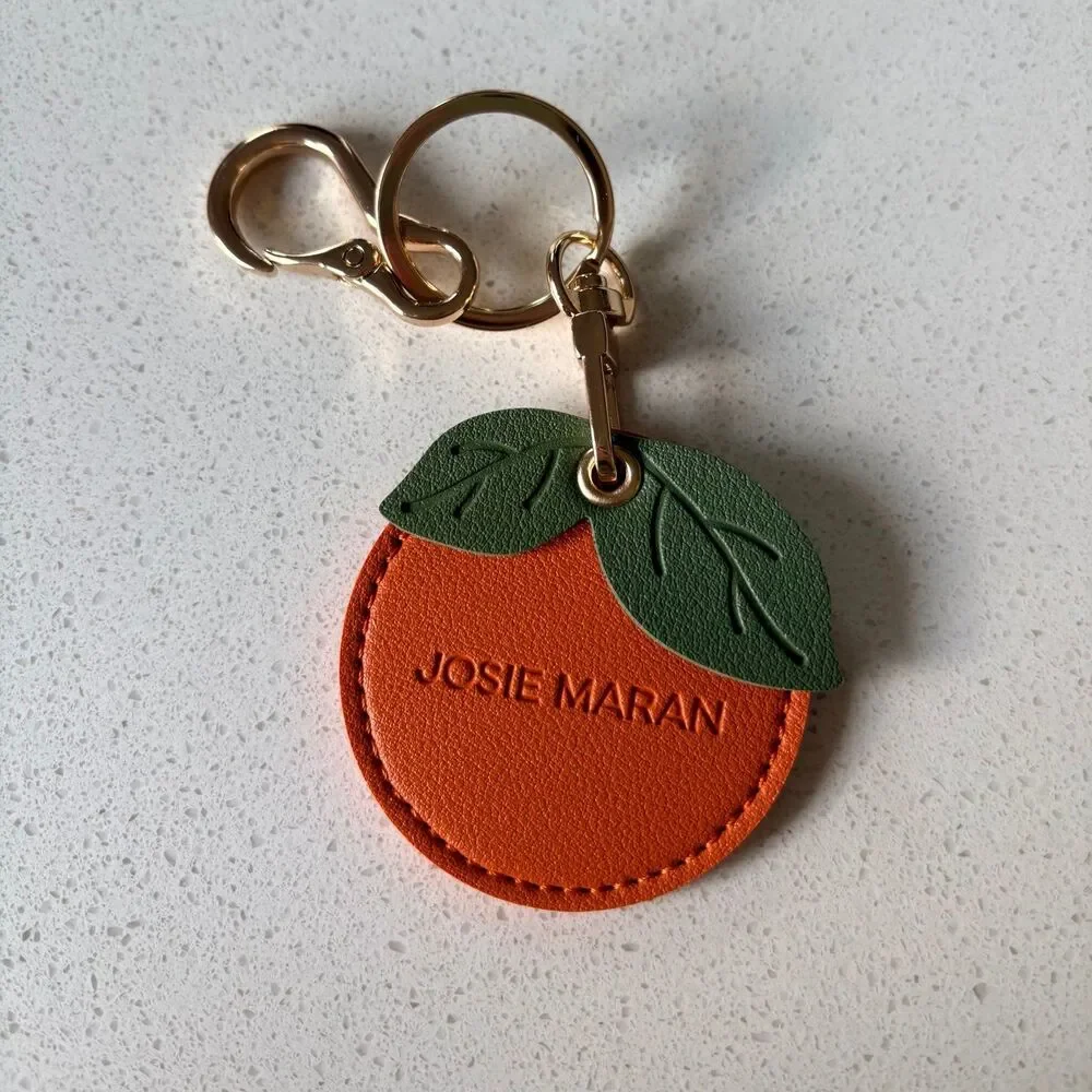 Josie Maran Orange Keychain with gold hardware